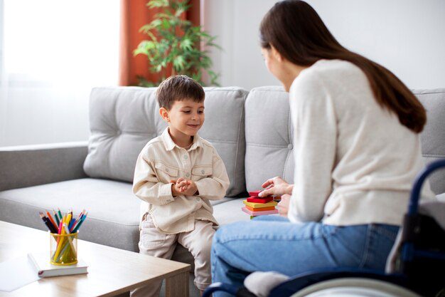 child-helping-his-disabled-mother_23-2149226821 (1)